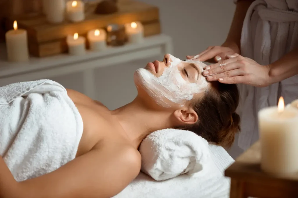 Woman laying on her back on a spa table